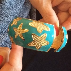 Aqua enamel bangle with gold starfish. Brand new